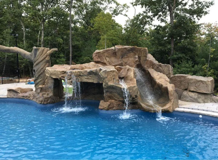 Stone pool grotto with waterslide