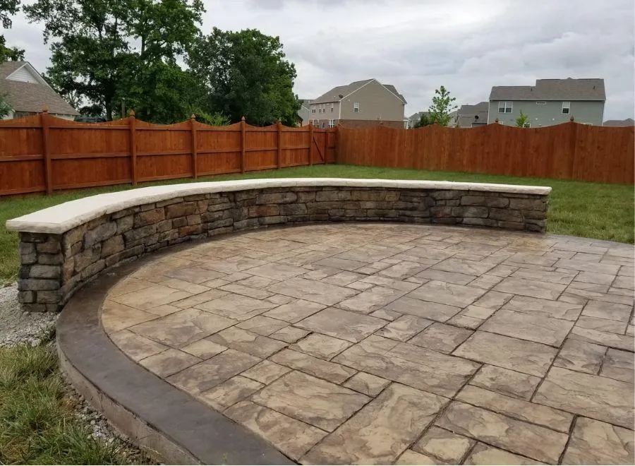 stone patio with low wall seating