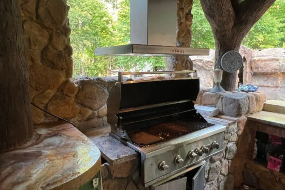 outdoor stone kitchen grill area